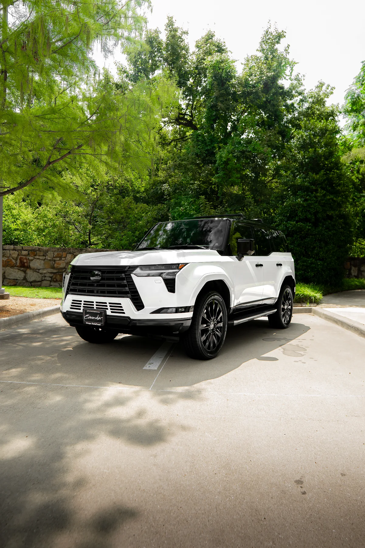 Samuel Rey's white SUV after wrap work by Wraps Redefined